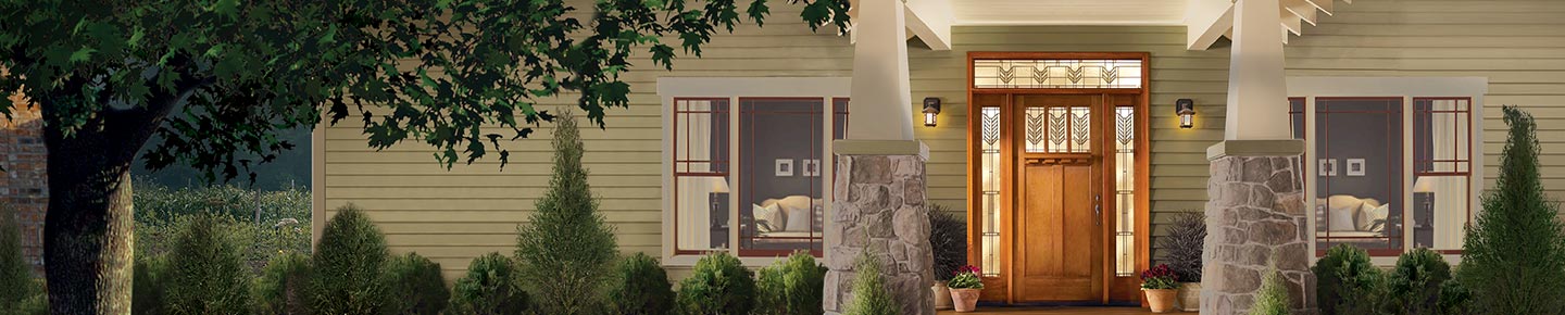 Beautiful exterior of a home with a new entry door. Renoviso installs Therma-Tru doors and Provia doors.