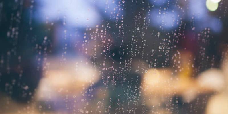 Rainy window with blurry background.
